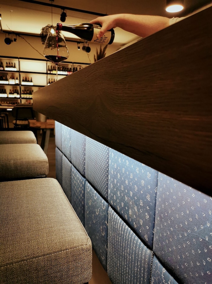 The bar is clad in Burgenland blue print fabrics.
