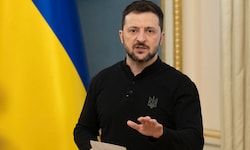 Ukraine-Präsident Selenskyj ließ sich vor einem Gemälde fotografieren, das den Kreml in Flammen ...