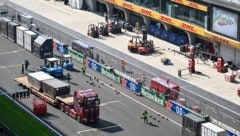 In China haben die Teams der Formel 1 mit logistischen Problemen zu kämpfen. (Bild: AFP/APA/Hector RETAMAL)