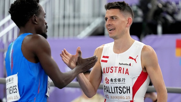 Raphael Pallitsch (r.)  (Bild: AP/Vincent Thian)