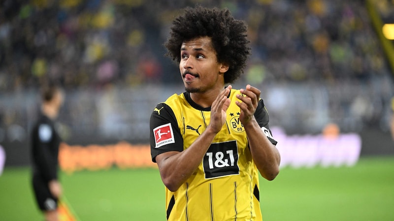 Dortmunds Karim Adeyemi war zufrieden. (Bild: AFP/UWE KRAFT)