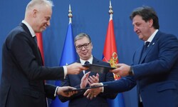 Unter den Augen von Serbiens Präsident Aleksandar Vučić unterzeichneten sein ...