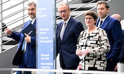 Union und SPD einig: CSU-Chef Markus Söder und CDU-Chef Friedrich Merz mit den ...