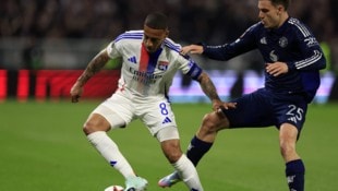Lyon (Tolisso li.) zittert um die Zukunft