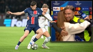 Matty Cash bekam nach dem Champions-League-Spiel gegen PSG eine Umarmung der Reporterin. (Bild: AFP/APA/Bertrand GUAY, X/eurofootcom)