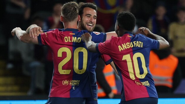 Große Freude bei den Barca-Kickern (Bild: AFP/LLUIS GENE)