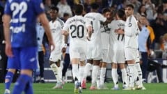 Die Real-Spieler bejubeln den Sieg gegen Getafe (Bild: AFP/AFP or licensors)