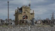 Michael Alexander Gloss soll in der Region Donezk (im Bild eine zerstörte Kirche im Ort ...