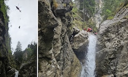 Die Bergretter und Crew des Notarzthubschraubers bereiteten im Bach die Taubergung vor (rechts), ...