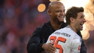 Vincent Kompany (l.) und Thomas Müller