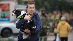 Ihren Hund konnte die Ukrainerin bei der Drohnenattacke in Sicherheit bringen. (Bild: EPA/SERGEY DOLZHENKO)