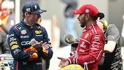 Lewis Hamilton (rechts) wurde nach einem Zwischenfall mit Max Verstappen mit einer Strafe belegt.  (Bild: AFP/GREG BAKER)