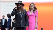 Billy Ray Cyrus und Liz Hurley Hand in Hand bei einer Promi-Veranstaltung in Rom.