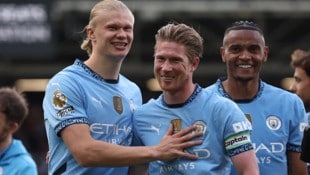 Kevin de Bruyne (Mitte) verlässt Manchester City. (Bild: AFP/ANNE-CHRISTINE POUJOULAT)