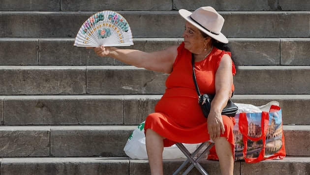 Eine Frau mit einem Fächer in Sevilla