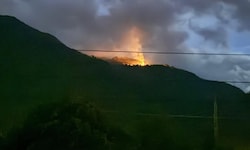 Die brennende Platzisalpe vom Talboden aus gesehen. 