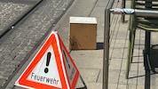 Feuerwehreinsatz mitten in der Grazer Herrengasse: Bienen mussten geborgen werden. (Bild: Marcus Stoimaier)