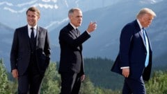Emmanuel Macron, Gastgeber Mark Carney und Donald Trump beim G7-Gipfel