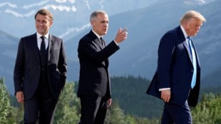 Emmanuel Macron, Gastgeber Mark Carney und Donald Trump beim G7-Gipfel