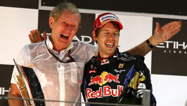 2010 jubelte Sebastian Vettel (re.) mit Helmut Marko in Abu Dhabi über den ersten WM-Titel