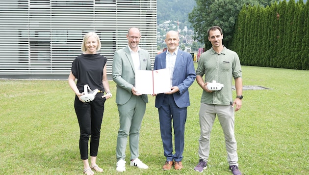 Gerber und Vizerektor Weihs mit Happ (li.) und Wachholz (re.)