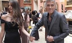 George und Amal Clooney beim Empfang im Buckingham Palace – auch hier gilt: Keine Handys ...