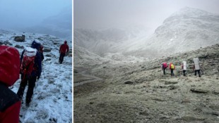 Bei Wind und Wetter – es schneite sogar – stiegen die Bergretter zu den Deutschen auf.