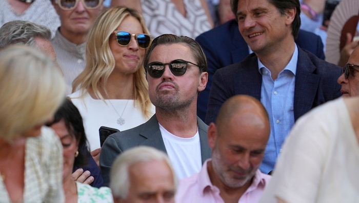 Schauspieler Leonardo DiCaprio und Lara Gut-Behrami im Hintergrund