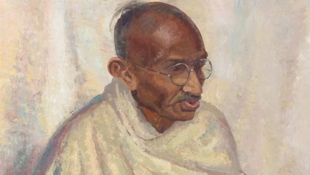 Gandhi hatte die gewaltlose Kampagne gegen die britische Kolonialherrschaft angeführt, die 1947 ...