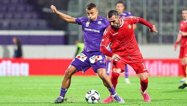 Die Wiener Austria um Kapitän Fischer (li.) siegte mit 2:0.