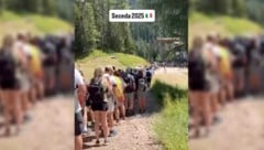 Warten statt Wandern: Die Bilder von Hunderten Bergtouristen in den Dolomiten, die für einen ...
