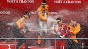 Die „Papayas“ feierten auf dem Podium mit Charles Leclerc.
