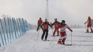 Salzburger Skilehrer bilden chinesische Skilehrer aus.