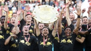 2023 holten die Bullen (in der Mitte Kapitän Ulmer) zuletzt den Meistertitel.