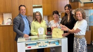 Chef Thomas Woller mit seinem engagierten Verkaufsteam.