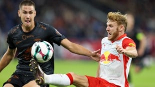 Yorbe Vertessen (re.) trifft auf seine Landsleute aus Belgien.