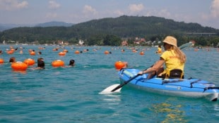Die Teilnehmer schwimmen 44 Kilometer in vier Kärntner Seen.