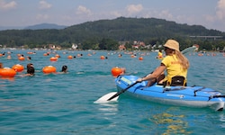 Die Teilnehmer schwimmen 44 Kilometer in vier Kärntner Seen.