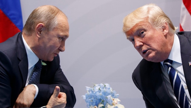 Von links: Russlands Präsident Wladimir Putin und sein Amtskollege Donald Trump