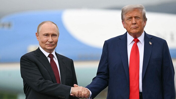Reichten sich die Hände: Putin und Trump