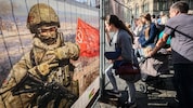 Ein Zaun mit Propaganda für den Ukraine-Krieg auf dem Roten Platz in Moskau
