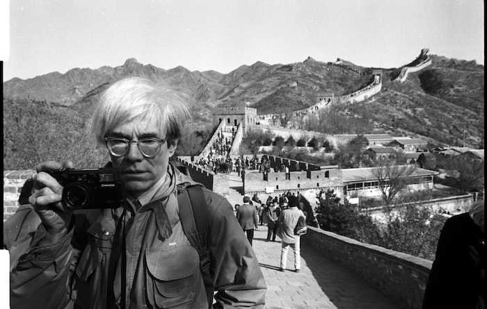 Christopher Makos – Andy on the Great Wall with Chinon (1982).