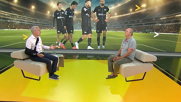 Rainer Pariasek mit Arm-Stütze
