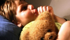 Eine Trennung der Eltern kann Kinder stark belasten.