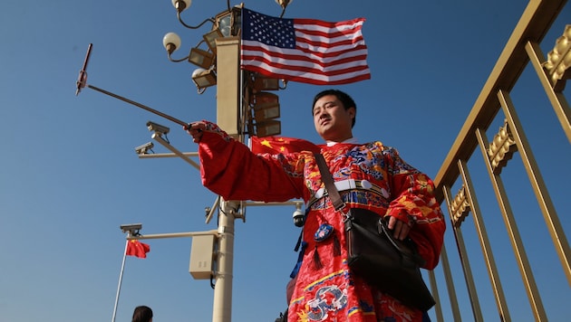 Ein chinesischer Tourist während eines Besuches des US-Präsidenten Donald Trump im Jahr 2017