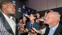Usain Bolt (links) zieht immer noch große Aufmerksamkeit auf sich.
