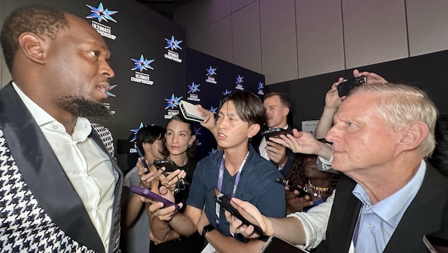 Usain Bolt (links) zieht immer noch große Aufmerksamkeit auf sich.