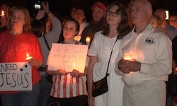 Hunderte Menschen nahmen am Freitagabend in Utah, an einer Kerzen-Mahnwache für den ...