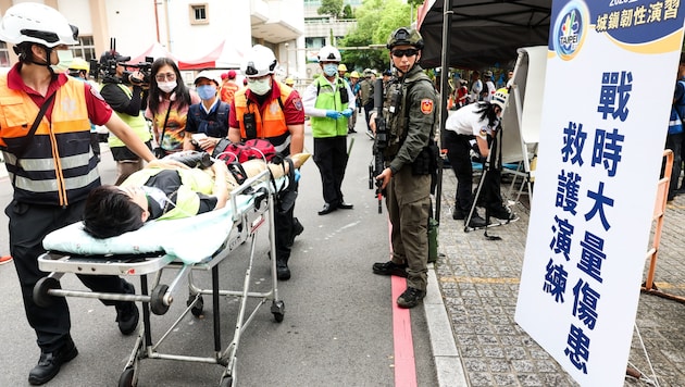 Übung einer Massenevakuierung beim jährlichen „Han Kuang“-Militärmanöver in Taipeh