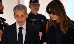 Sarkozy mit seiner Ehefrau Carla Bruni vor der Urteilsverkündung